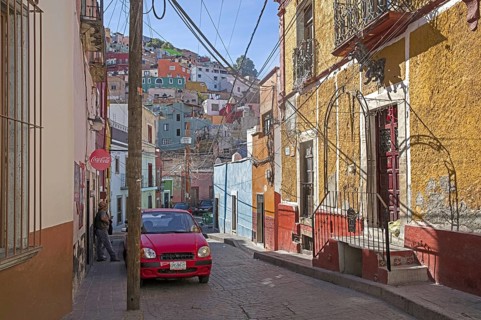 Colourful houses in narrow street alley in the city Guanajuato, Central Mexico