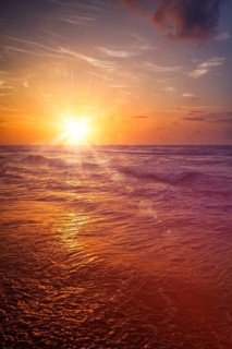 Ocean sunset, Hikkaduwa, Sri Lanka. With light leak and lens flare