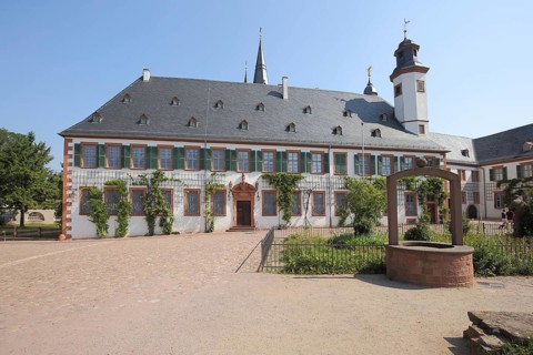 Building in the monastery complex with draw well, Seligenstadt, Main, Hesse, Germany, Europe