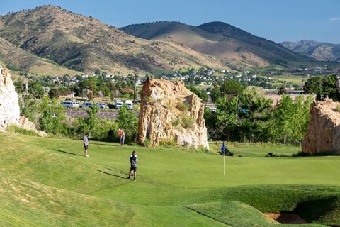 Golden, Colorado, The Fossil Trace Golf Course. Golfers play near footprints of dinosaurs and