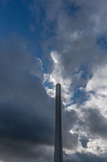 Cloudy sky with chimney of the thermal power station, Erlangen, Middle Franconia, Bavaria, Germany,