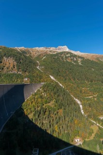 Schlegeis dam (altitude 131m), valley side, Zams valley, mountain stream, forest, Zillertal Alps,
