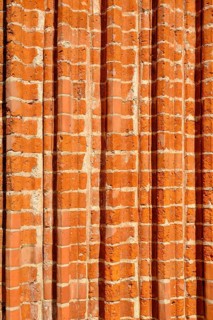 Fascia of a church portal with archivolts from the brick Gothic period, using the example of the