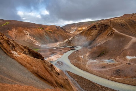 Steaming streams between colourful rhyolite mountains, Hveradalir geothermal area, Kerlingarfjöll,