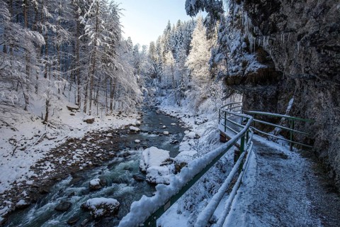 Winter, snowy landscape, river Breitach and hiking trail through the Breitachklamm gorge near