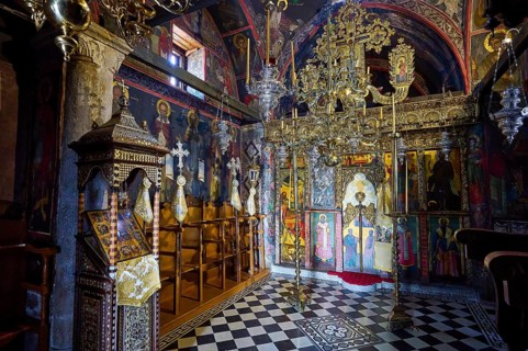 Interior view of an Orthodox church with icons and magnificent golden decorations, Zoodochou Pigis
