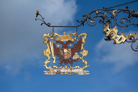 Nose shield with double eagle of a historic restaurant, Rottweil, Baden-Württemnerg, Germany,