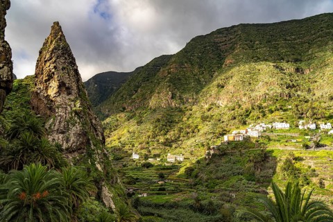 One of the twin rocks Roques de San Pedro, landmark of Hermigua, La Gomera, Canary Islands, Spain,