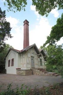 Former water cottage with chimney in Verna Park Stadtpark, cottage, chimney, Rüsselsheim, Hesse,