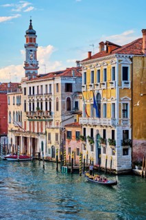 VENICE, ITALY, JUNE 27, 2018: Grand Canal with boats and gondolas on sunset, Venice, Italy, Europe