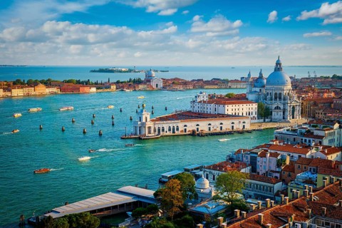 View of Venice lagoon and Santa Maria della Salute church on summer day. Venice, Italy, Europe