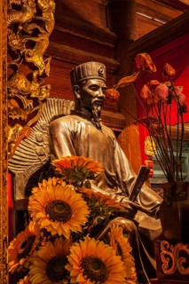 HANOI, VIETNAM, JUNE 11, 2011: Confucius statue at the Temple of Literature. This temple is