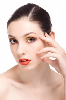 Beauty fashion girl. Portrait of beautiful young woman with fresh clean skin isolated on white