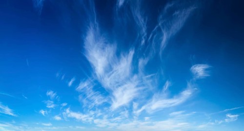 Blue sky with white cirrus clouds