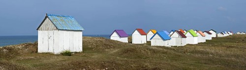 Colourful beach cabins at Gouville-sur-Mer, Lower Normandy, France, Europe