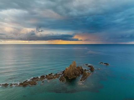 The reef Arrecife de las Sirenas in the Nature Reserve Cabo de Gata-Nijar, at sunrise with heavy
