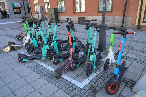 Electric scooter, Riddarhustorget, Gamla Stan Old Town, Stockholm, Sweden, Europe