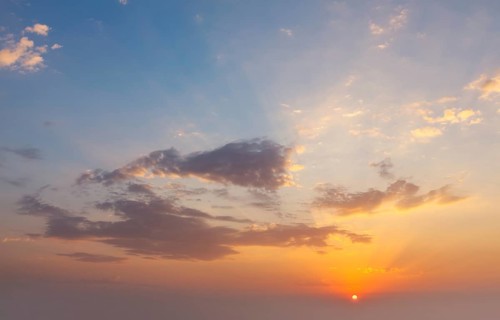 Beautiful dramatic scenic sunset sky background