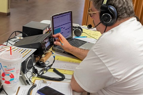 Bosque Farms, New Mexico, John Schaaf, an amateur radio operator, participates in the American