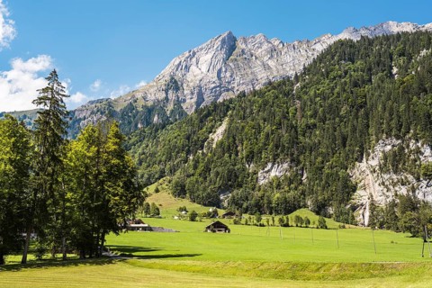 Alpine huts in Klöntal with the 2294 metre high Mutteristock, Canton Glarus, Switzerland, Europe