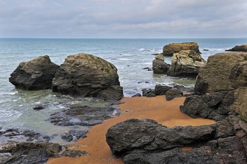Eroded sea stacks at the Plage des Cinq Pineaux at Saint-Hilaire-de-Riez, La Vendée, Pays de la