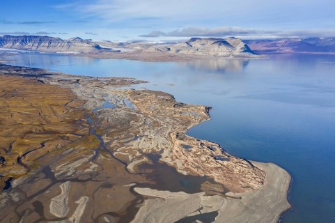 Aerial view over Ekmanfjorden, fjord in the Nordre Isfjorden National Park in summer, Nordfjorden,