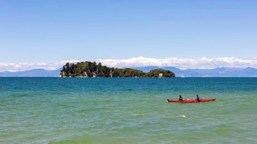 Motuareronui-Adele Island, Apple Tree Bay, canoeist Kaiteriteri, New Zealand, Oceania