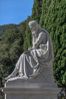Sculpture with plaque in front of the Pantheon in the Staglieno Monumental Cemetery, Cimitero
