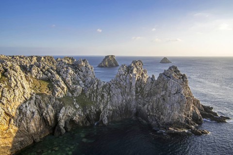 Sea cliffs at the Pointe de Pen-Hir and Les Tas de Pois sea stacks on the Crozon Peninsula,