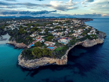 Sunset over Cala Anguila-Cala Mendia from a drone, Porto Cristo, Majorca, Spain, Europe