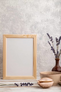 White wooden frame mockup with lavender in ceramic vase, linen textile, cup of coffee and bun on