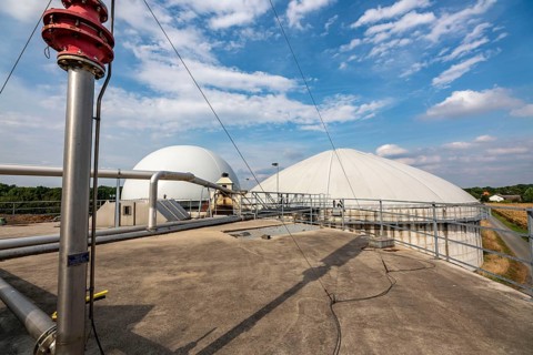 Biogas plant, gas storage, with dome, use of solid manure as energy source, gas pipelines, on a