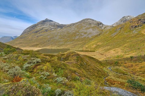 View of the Valldalen valley, Reinheimen National Park, lake and mountain, Møre og Romsdal, Norway,