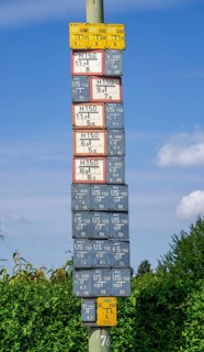 Signs for supply facilities, usually in the carriageway or pavement, indicate underground hydrants,