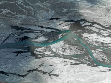 Top-down, aerial view, Burkhan mountain valley with meandering river, Terskey Ala-Too, Tien Shan,