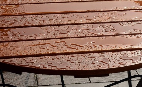 Europe, Germany, Hamburg, Rathausmarkt, Bistro table in the rain, Europe