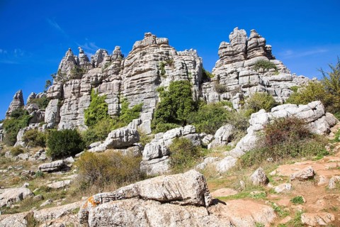 Dramatic limestone scenery of rocks shaped by erosion and weathering at El Torcal de Antequera
