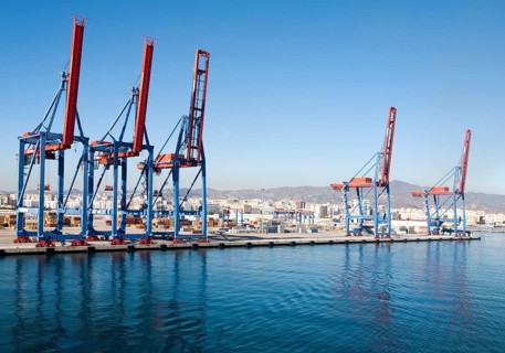 Cranes standing on quayside in the port of Malaga, Spain, Europe