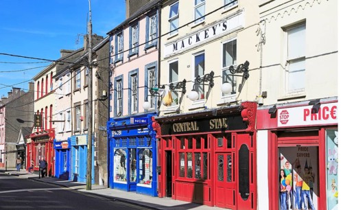 Colourful shops and pub historic high street buildings, Youghal, County Cork, Ireland, Irish