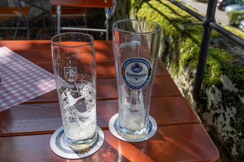 Empty beer glasses on a table in a beer garden, Bavaria, Germany, Europe
