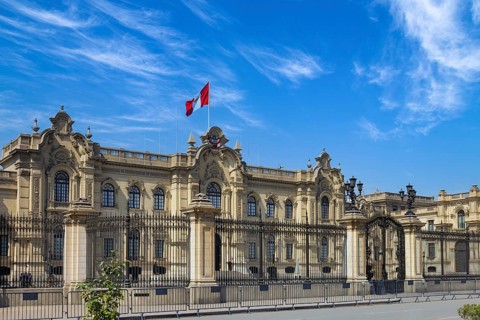 Lima, Peru, Government Palace on colonial Central plaza Mayor or Plaza de Armas in historic center,