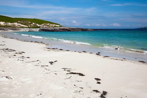 Sandy beach at Bagh a Deas, South Bay, Vatersay island, Barra, Outer Hebrides, Scotland, UK