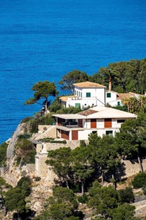 Villas on the cliffs in the north-west of the island, near Alconàsser, Serra de Tramuntana,