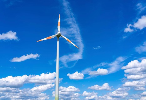Wind turbine, wind energy plant from the manufacturer Enercon, blue sky with many white clouds,