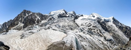 High alpine glaciated mountain landscape, La Jonction, Glacier des Bossons meets Glacier de