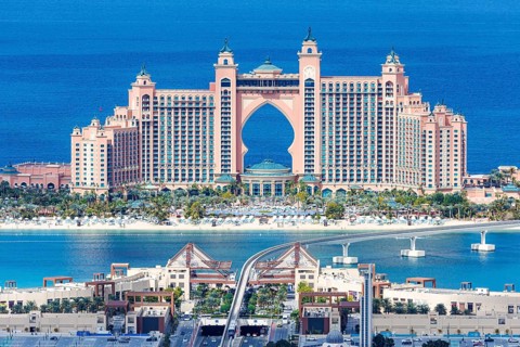 The Palm Jumeirah with Atlantis Hotel artificial island from above in Dubai, United Arab Emirates,