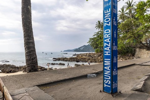 Tsunami Hazard Zone. Warning sign, signposting of escape routes in the event of another seaquake.