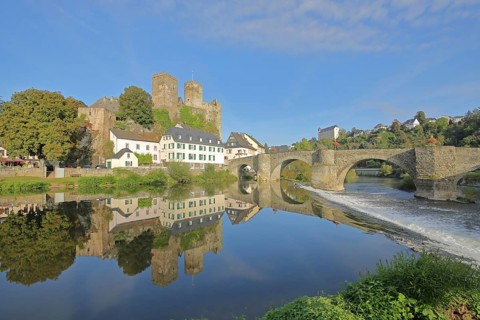 Old Lahn bridge built 1448 with castle built 12th century, Lahn valley, reflection, historic stone