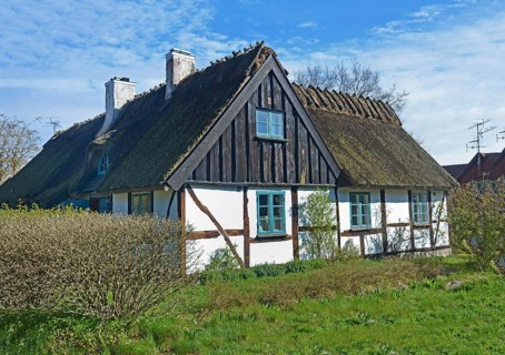Half timbered thatched cottage in Knäbäckshusen, a small fishing village near Rörum, Simrishamn