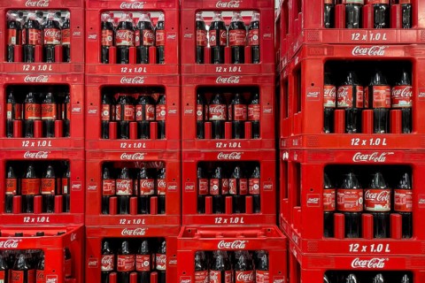 1 litre bottles of sugary drink Coca Cola, Germany, stacked in crates, Europe